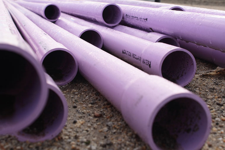 A stack of purple pipes