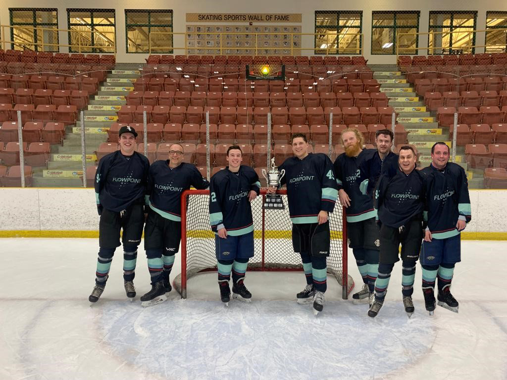 A hockey team made up of Flowpoint employees