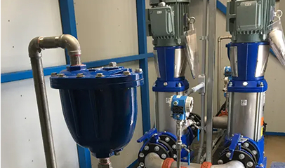 Close up view of pipe and water pressure management devices